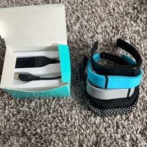 Fitbit flex with charger and 5 bands